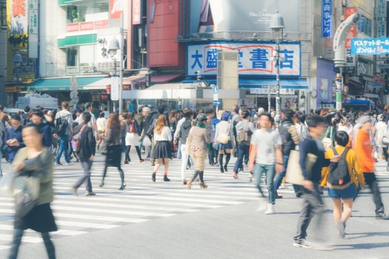 over 1,000 pedestrians crossing per signal at high traffic hours