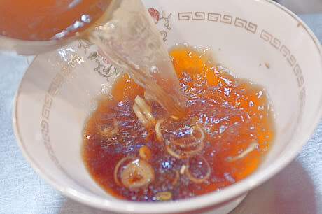 soy-based soup that is made out of niboshi (dried sardine), broth and vegetables