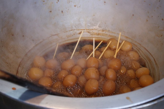 a big pot of these gelatinous-textured treats, simmering in a soy sauce base