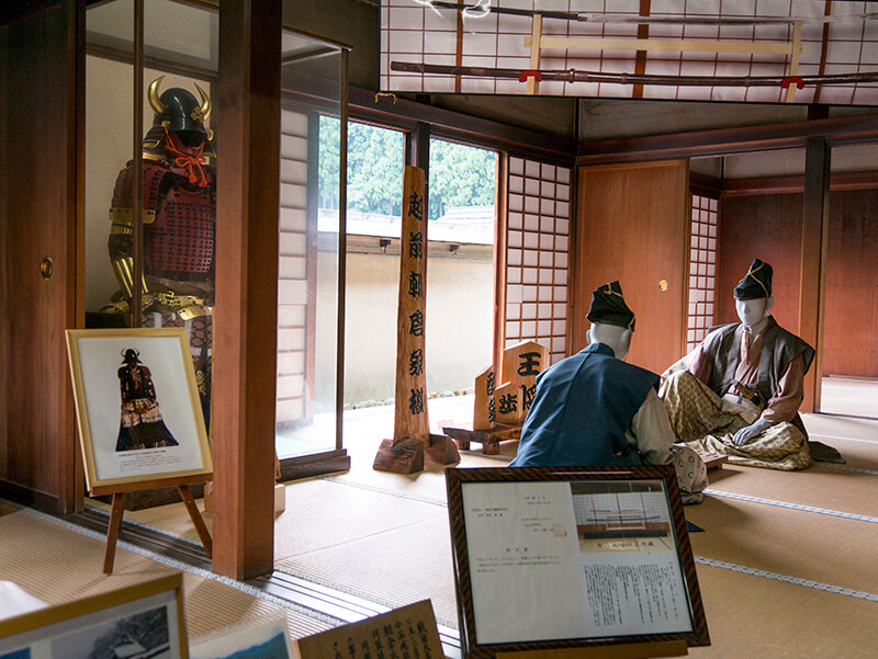 mannequins are set up inside the homes to reenact historical scenarios