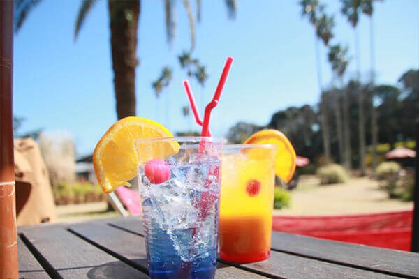 Sipping a refreshing cocktail when sunbathing