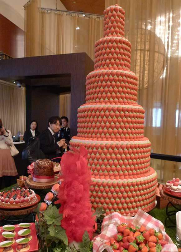 There was a tower of 6,000 macaroons made from real strawberries standing