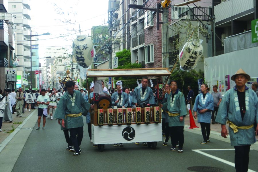 Kagura, a group of musicians moving with the mikoshi. Kagura is also the word for the music itself at matsuri.